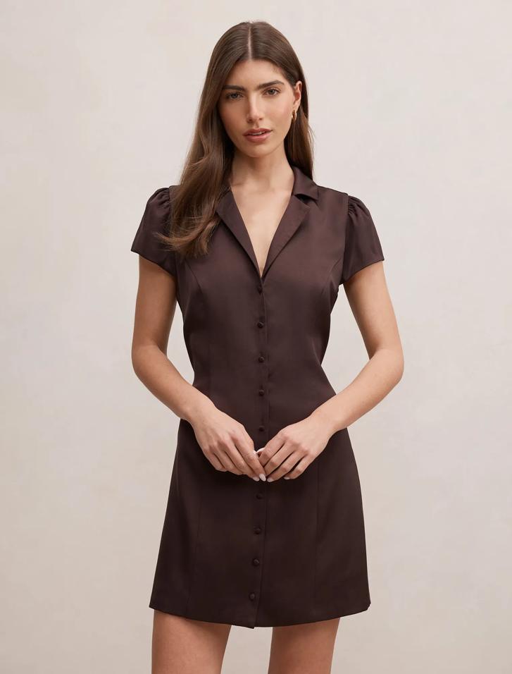 blair brown dress Pre-order the Blair Brown Tulip Mini Dress for flirty curves, puff-sleeve fun, and secret pockets! Shop Now: www.getthattrend.com/products/blair- brown-tulip-skirt-high-neck-mini-dress
